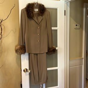 2 piece button front pantsuit with raccoon collar and cuffs. fully lined